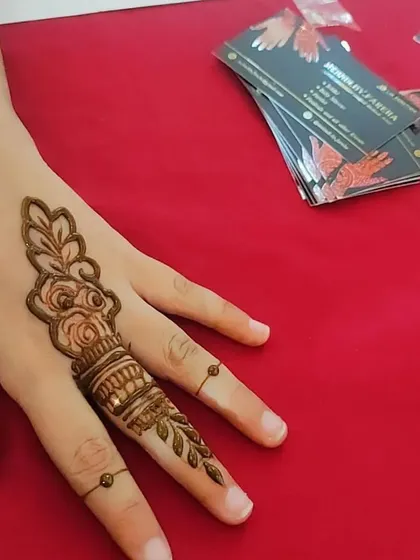A beautiful and intricate design just for one finger, perfect for someone who wants a small but detailed piece of art.