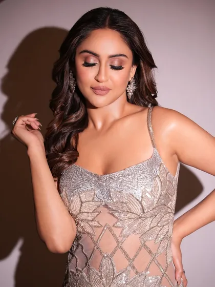 Soft glam perfection. With eyes closed, you can see the delicate blend of eyeshadow and the flawless skin finish that is my signature. A truly gorg look.