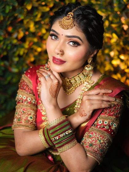 A close up of the South Indian bridal look I created for my masterclass. The focus here is on the beautiful details of the embroidered blouse, the traditional gold jewelry, and the flawless makeup.