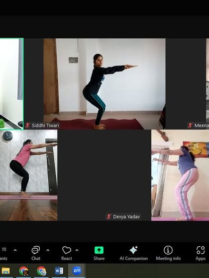 Participants holding Utkatasana (Chair Pose) during the online workshop. This powerful pose strengthens the entire lower body and builds endurance, which is beneficial for overall metabolic health.