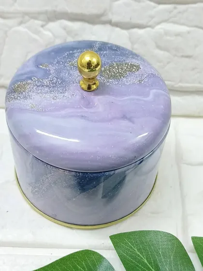 This printed tin box with a beautiful purple and blue marble design is a great option for packaging small gifts, jewelry, or even as a container for handmade candles.