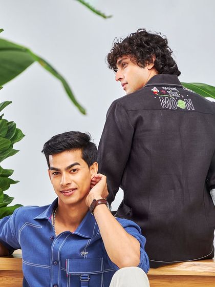 Ideal for dawn to dusk. This shot from the Antriksh collection reflects the spirit of the cosmos, with a "Shoot for the Moon" embroidered shirt perfect for your travels.