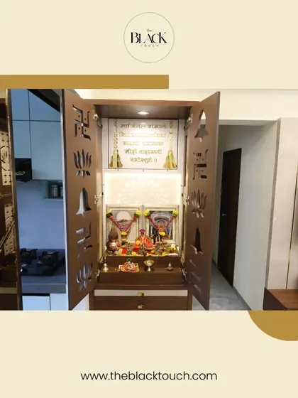 A beautiful mandir design with intricate jali-cut doors. We specialize in creating sacred spaces that are both traditional and elegant.