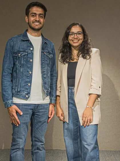 Two attendees posing for a photo. Friendships are often sparked at our events, and we love seeing our community grow.