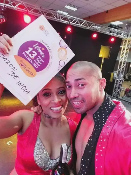 That winning feeling. Celebrating a victory at a Salsa festival. These moments are a testament to the hard work and perseverance we've put in together.