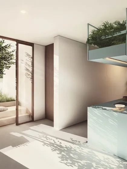 We design spaces that encourage connection. In "The Nest," the shared kitchen for the compact apartments opens directly onto a stepped courtyard, creating an informal social hub where residents can interact while enjoying the indoor-outdoor Goan lifestyle.