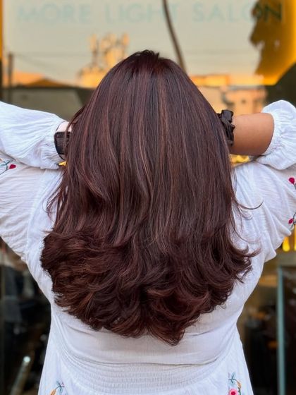 A total game-changer with Mahogany Global and babylights. This look is neat, clean, and perfect, adding subtle dimension to a rich red-brown base.