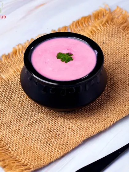 Add a pop of color and nutrition to your meal with our Beetroot Raita. This vibrant, creamy yogurt dip is infused with the earthy sweetness of beets and a hint of spice.