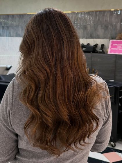 This is a cool-toned, deep ash blonde that looks incredibly natural on medium to dark hair. It's the perfect way to get a soft, subtle glow.