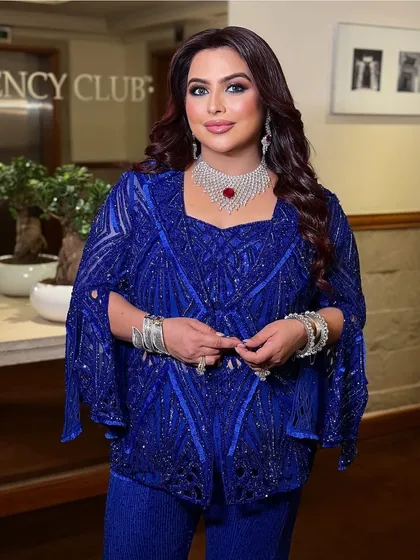 A close-up of my client in the Active Blue Sharara set, a look that is both bold and beautiful.