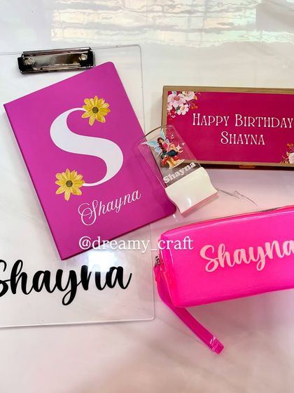 A customized combo I dispatched for a birthday girl. This set includes a personalized clipboard, pouch, stamp, and chocolate box, all in her favorite color, pink.