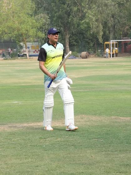 Walking on the pitch during the tournament. I had the opportunity to contribute with the bat, scoring 25 runs in 13 balls, which was personally satisfying.