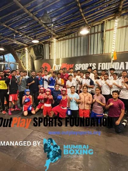 A group photo of our team. We are a community of fighters, coaches, and supporters, managed by Mumbai Boxing Academy.