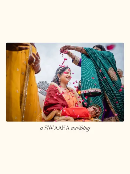 A beautiful ritual moment, as a family member showers the bride with flower petals during her Chooda ceremony.
