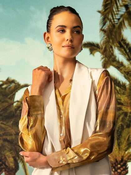 A breezy, tropical scene with palm trees, created using projection. This is a perfect example of how I can transport a shoot to any climate or location without leaving the studio.