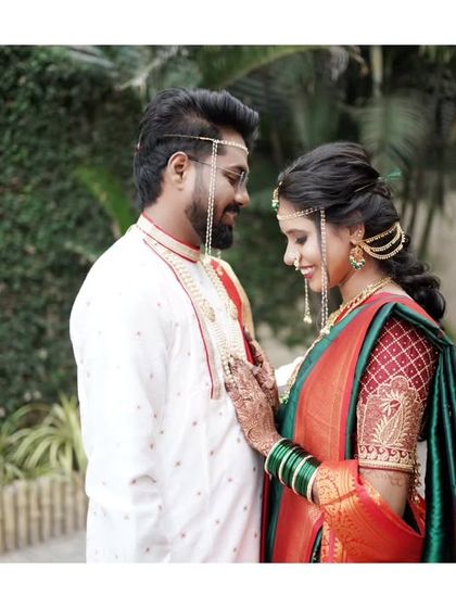 A tender moment with the bride resting her hand on the groom's chest, a portrait of love and trust.