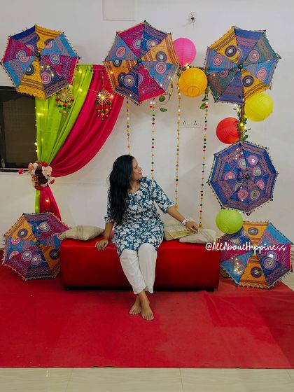The perfect photo spot for a Mehendi ceremony, with a comfortable seating area set against a festive and traditional backdrop.