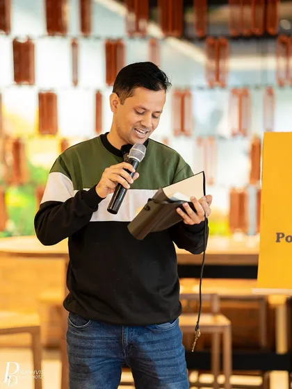 A performer reads from his book, contributing to the theme. The event was a celebration of the strength found in vulnerability.