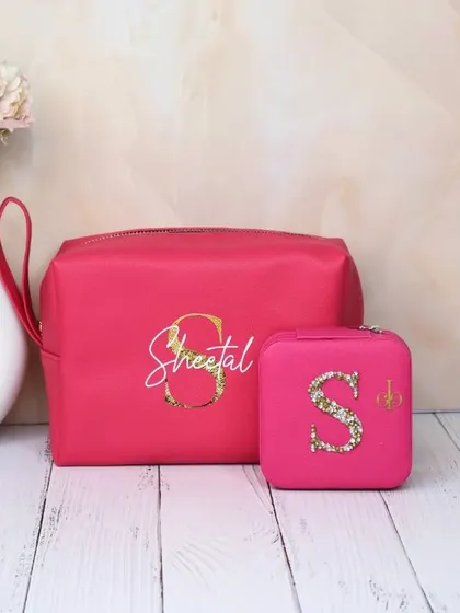 The same personalized utility pouch and jewelry organizer set, shown here in a vibrant hot pink. A perfect, coordinated gift for keeping accessories organized.