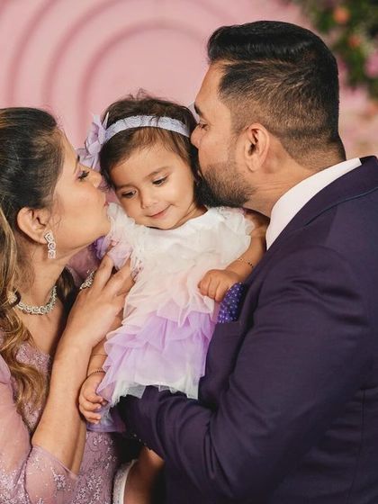 A precious moment with fairy Nia and her parents. The love and happiness in this photo are what make my work so rewarding.