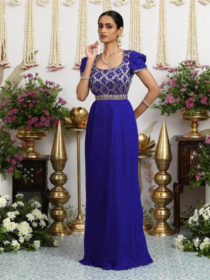 The full, majestic view of the royal blue gown, a perfect statement piece for a grand reception.