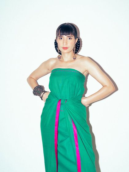 Here I styled a simple cotton saree in a modern, functional double-knot drape without a blouse. It's a fierce, contemporary take on the six-yard staple.