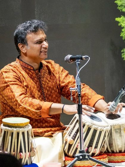 The versatile Pramath Kiran on tabla. Besides the mridangam, he plays a variety of percussion instruments, adding rich layers of rhythm to our music.
