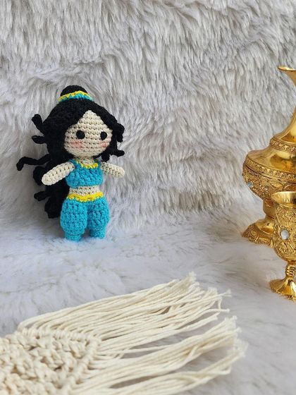 Princess Jasmine from Aladdin. I loved creating her iconic blue outfit and hairstyle. She is ready for a magic carpet ride and makes a wonderful addition to the Disney princess collection.