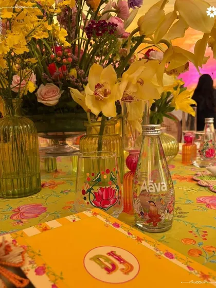 The Mehendi for Jeet Adani and Diva Shah was a vibrant tribute to India's street food culture. The decor, with its bright floral arrangements and custom details, created a festive atmosphere that was both playful and elegant.