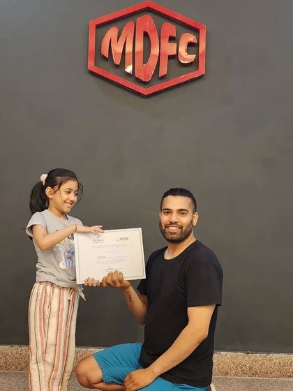 She's so happy to receive her certificate. It's moments like these that I cherish.