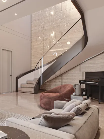 A staircase can be more than just a connection between floors; it can be the sculptural heart of a home. Here, we used a flowing design against a textured marble wall to create a focal point that is both art and architecture.
