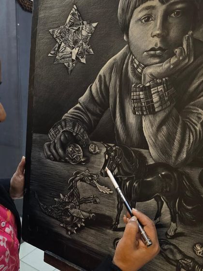 The artist adds detail to the boy's portrait, using the white pencil to define his features and expression with great care.