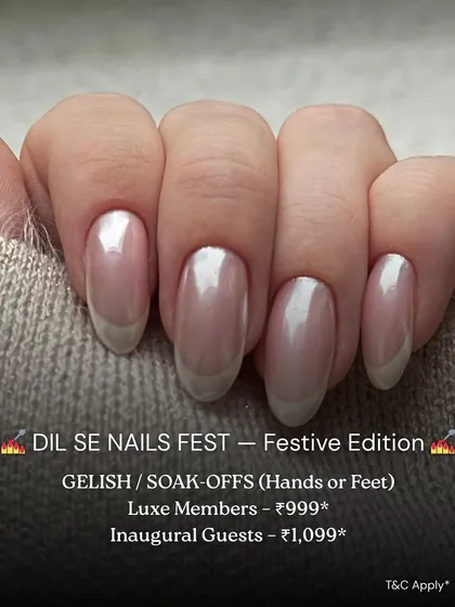 A festive offer for a Gelish or soak-off service. The image features a beautiful set of pearlescent nails with a modern French tip, showcasing a sophisticated finish.