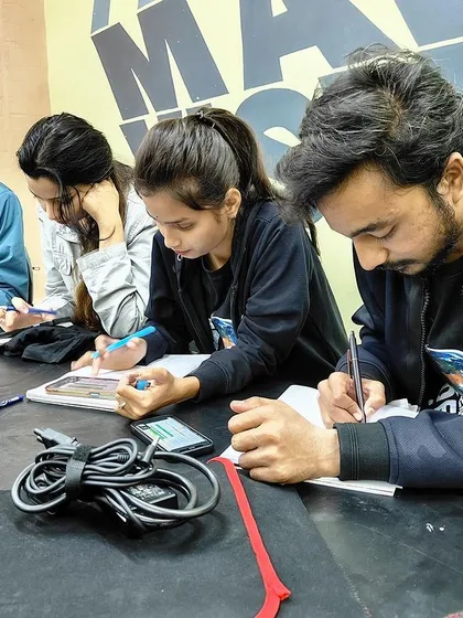 A closer look at students during a workshop focused on mastering interior contracts. I believe in hands-on learning, where you are actively engaged in drafting, analyzing, and understanding the critical details that protect you as a designer.