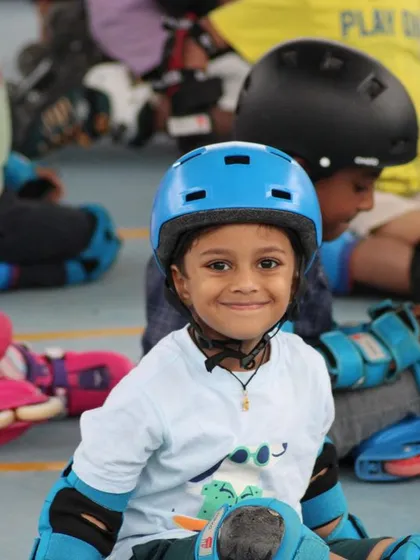 This smile says it all. For me, the most important thing is seeing the children happy and enjoying themselves. Our beginner roller skating coaching is all about finding the joy in every glide and every little victory.