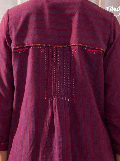 The back of our Haveli Soof-embroidered dress, showing the gathers and yoke detail. Every element is crafted with care by our artisans.