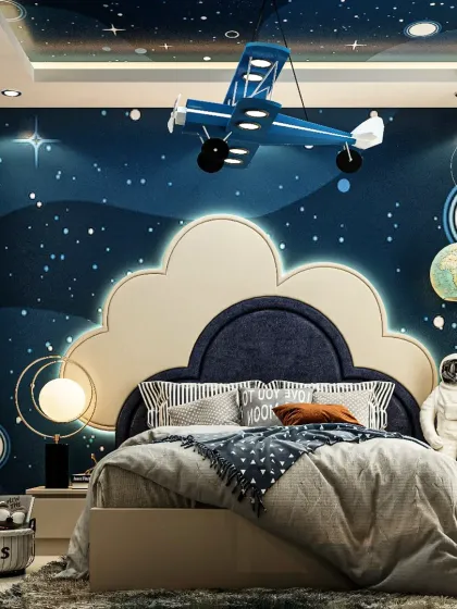 We design kids' rooms that spark imagination and grow with your child. This space-themed bedroom features a galaxy mural on the ceiling and walls, a custom airplane light fixture, and an astronaut figure, turning a simple room into a universe of adventure.
