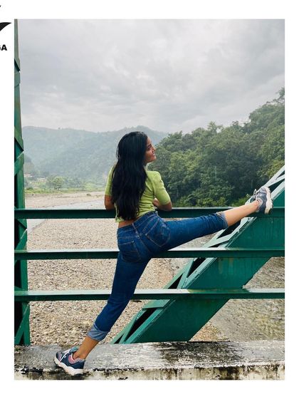 A simple, mindful stretch in the midst of nature. This shows that yoga isn't always about complex poses; it's about creating space in your body and mind.