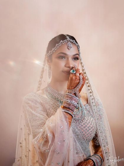 A creative shot capturing the bride's beauty and the dreamy ambiance of the wedding.
