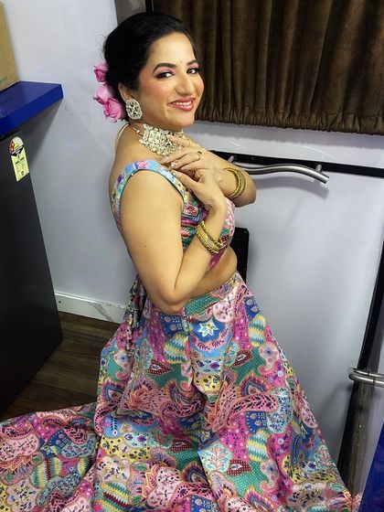 Kavya's full look, perfect for a sangeet or reception guest. She looks vibrant and ready to celebrate.