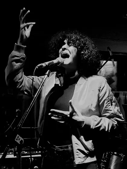 Fully in the moment during a jazz and soul set at Cobbler & Crew in Pune. This black and white photo captures the raw passion I bring to every performance, no matter the size of the stage.