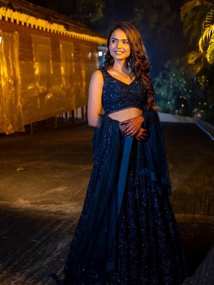 The full look in a beautiful nighttime setting. This soft glam style ensures you look just as stunning in your event photos as you do in person.