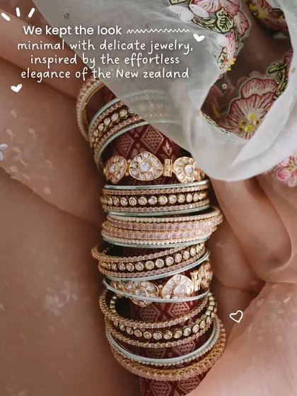 The finishing touches are everything. For this beach wedding, we kept the jewelry minimal and delicate, with these beautiful stacked bangles adding just the right amount of sparkle without overwhelming the effortless elegance of the look.