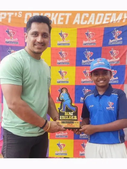 Yadnesh Mule is awarded Best Fielder in the U-12 division for his exceptional work stopping runs and creating chances.