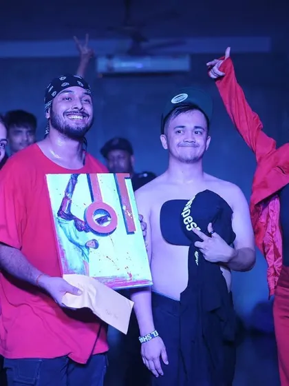 A group photo with the judges and my opponent after the win. It's all about community and celebrating the art form together.