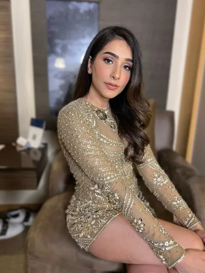 Nishtha ready for her event. The makeup is modern and chic, perfect for a cocktail party or a special night out.