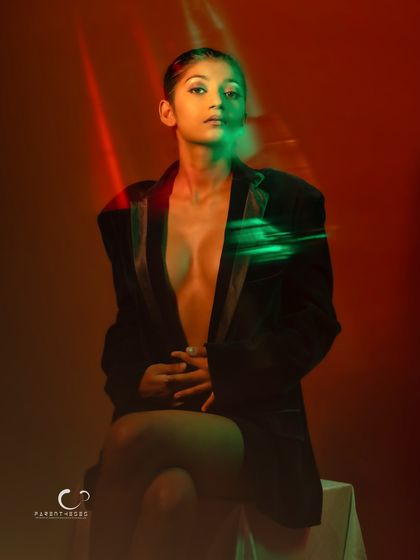 An experimental shot that incorporates lens flare and motion blur with the colored gels, creating a dynamic and abstract image.