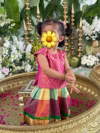The little ones deserve to be stylish too. My daughter Siya looks adorable in her traditional South Indian pattu pavadai, a special outfit for a special occasion.