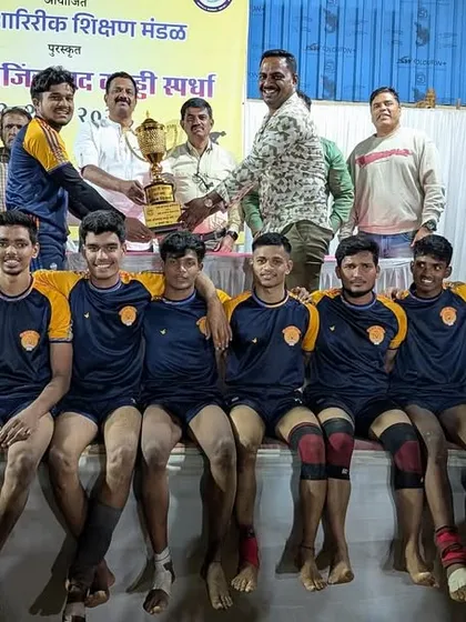 Our coach presenting the championship trophy to the victorious sub-junior team.