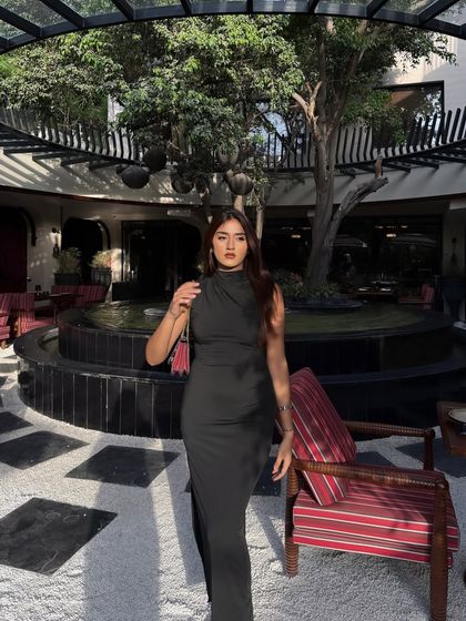 A sun-kissed shot in the black dress, creating beautiful shadows.